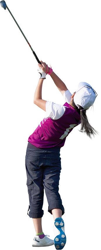 Young girl swinging a golf club